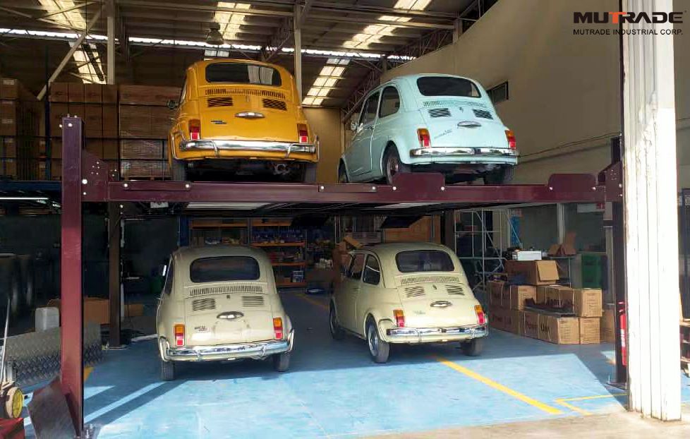 Mutrade solution is a four-post twin platform parking lift FPP-2T . The carrying capacity of one parking space is 2000 kg, while the platform size and lifting height can be changed in accordance with the requirements of the project. FPP-2T is driven by one cylinder and ropes. This unique car parking solution is completely safe - it has all the features described above that our standard four-post parking lift has - full way anti-falling locks , wire break detection, safe operation - up and down buttons, emergency stop button, etc. 4-стоечный гидравлический парковочный подъемник Mutrade CE TUV EAC, высокое качество, цена в Китае, гараж